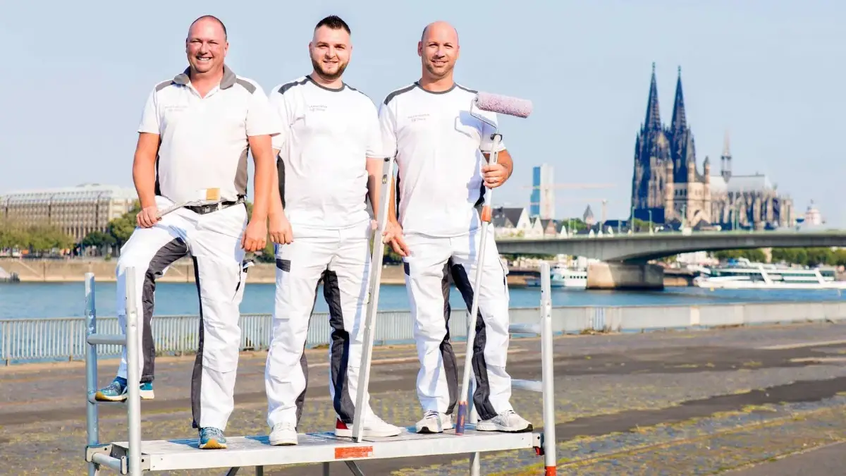 Maler Köln mit Team vor Kölner Dom